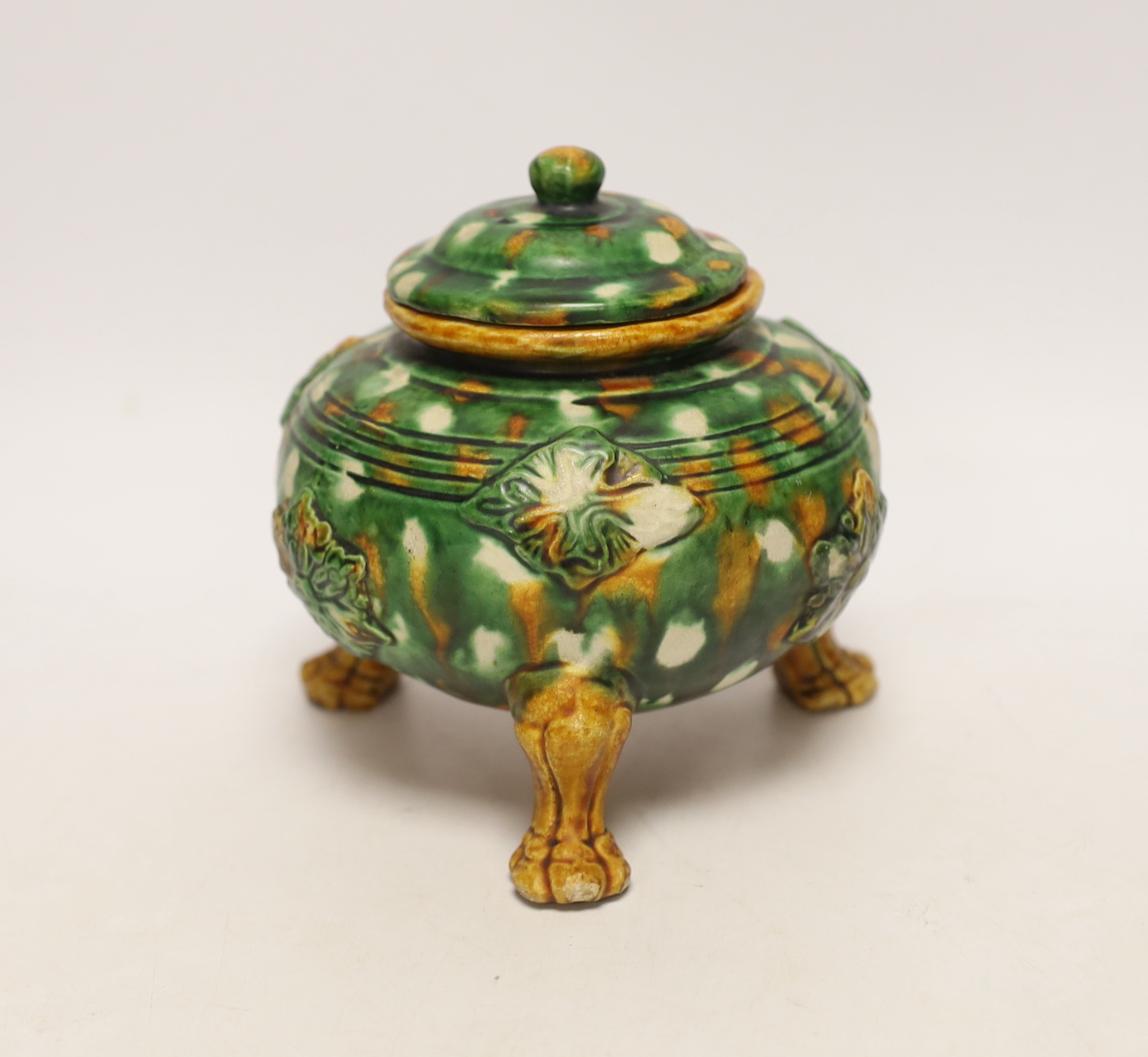 A Sancai three legged lidded pot, 13cm